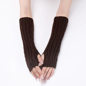 Detailed cable knit pattern on dark brown long fingerless gloves for autumn warmth