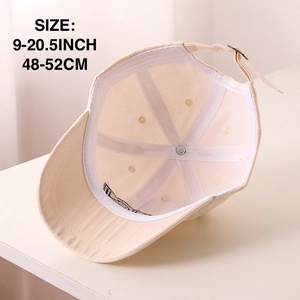 Detail view of adjustable strap and sweatband inside the beige kids tiger baseball cap