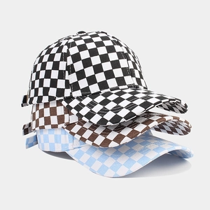 Detailed grid patterns of classic checkerboard baseball caps in black, brown and light blue