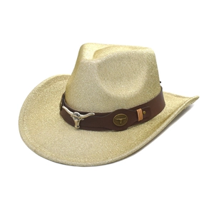 Glittery gold western cowboy hat with a brown leather band and metallic bull head emblem