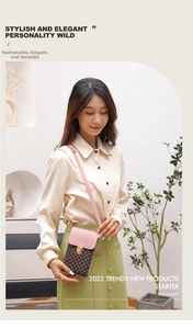 Close-up of pink and brown patterned crossbody bag with a golden metal buckle