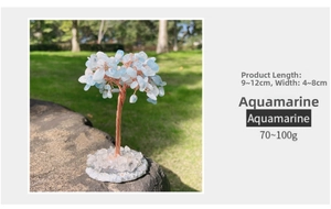 Aquamarine crystal tree of life with copper wire on a clear geode base for home decor