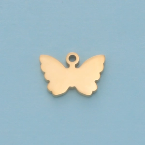 Close-up of a polished gold butterfly pendant with smooth mirror finish and bail connector