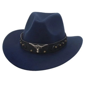 Detail of dark blue felt cowboy hat with bull head ornament and studded leather band