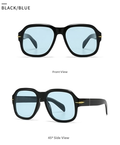 Detail of square flat top sunglasses with thick black frames and light blue lenses