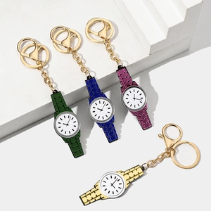 Creative watch-shaped acrylic keychains in four vibrant colors with gold metal rings