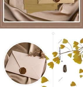 Close-up of pink linen texture envelope with golden For You wax seal on satin background