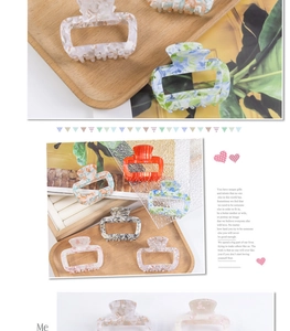 Detailed close-up of macaron colored marble pattern hair claws with square hollow design