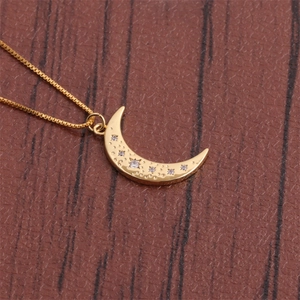 Fashionable gold-plated moon crescent pendant necklace with zircon stones on leather