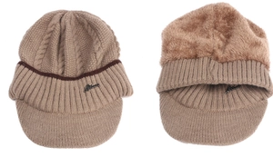 Detailed close-up of khaki knitted peak cap featuring thick cable knit and warm fleece lining