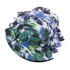 Detail of four colorful tropical palm tree print bucket hats with reinforced stitching