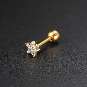 Detailed view of gold star stud earring with inlaid zircon and screw ball back
