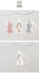 Detail of three plush Christmas tree angel pendants with wool felt and metallic stars