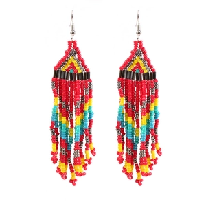 Detailed view of colorful seed bead tassels on bohemian long dangle earrings