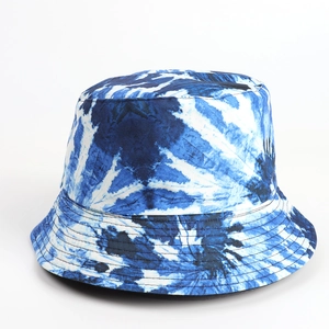 Detailed close-up of blue and white tie-dye cotton canvas bucket hat with stitching