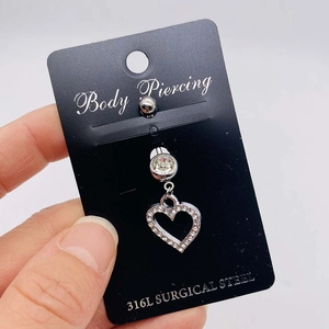 316L surgical steel belly ring with sparkling crystal heart pendant in silver finish