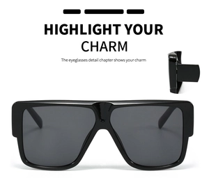 Detail view of stylish square black oversized sunglasses with elegant side hinge details