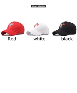Detailed close-up of high-density Chinese lion embroidery on baseball caps in three colors
