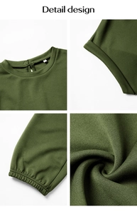 Detail design of green knit short sleeve top showing neckline, cuffs, and hem texture