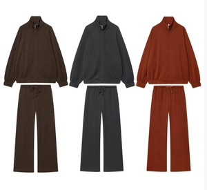 Three casual lounge sets featuring zip hoodies and wide-leg pants in three distinct colors