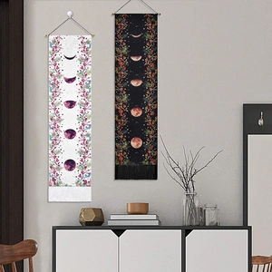 Bohemian moon phase and floral wall tapestries with tassels in black and white styles