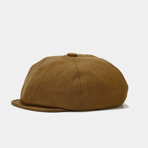 Detail shot of the caramel cotton beret showing durable twill texture and retro stitching