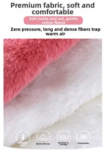 Detail of pink and white plush faux rabbit fur fabric with thick warming texture