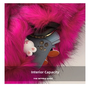 Internal view of faux fur bag showing capacity for smartphone, wallet and accessories