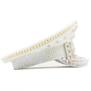 White sequined captain hat with pearls, shells, and BRIDE text for bridal party events
