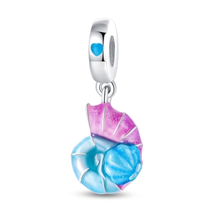 Detail of pink and blue enamel nautilus shell charm with a tiny blue heart on the ring