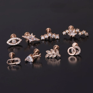 8-piece set of rose gold 16G stainless steel labret studs with zircon celestial shapes