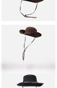Détail de chapeaux de soleil outdoor avec broderie 'travellers' et mentonnière réglable