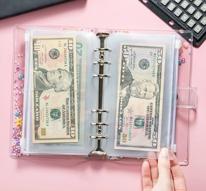 Close-up of A5/A6 PVC binder pockets with sequins and money organization slots