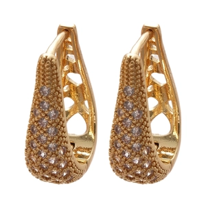 U-shaped gold earrings with zircon stones and heart-shaped hollow details on white background