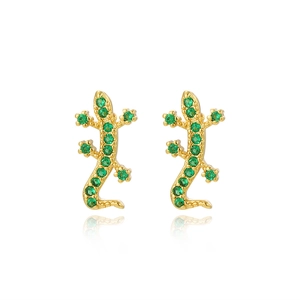 Detailed view of gold plated gecko stud earrings inlaid with vibrant green cubic zirconia