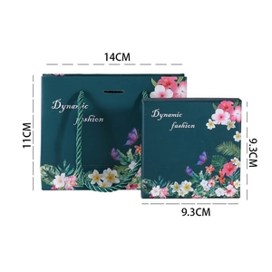 Dark green gift box set with floral pattern and matching paper bag for birthdays