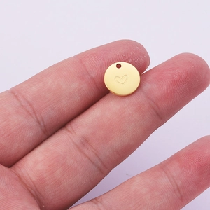 Minimalist 18K gold stainless steel round disc pendant with heart engraving on fingertip