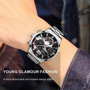 Close-up of a men's quartz business watch with a metal band on a model's wrist