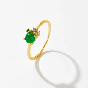 Minimalist S925 sterling silver ring with green center stone and purple accents