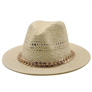 Classic beige straw sun hat featuring a modern decorative gold metal chain accent