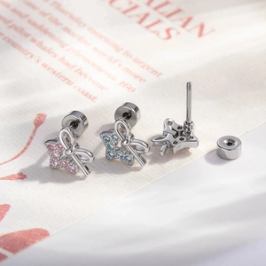 Micro-inlaid zircon bow and star cartilage piercings with pink and blue stones