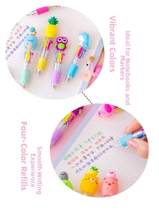 Close-up of cute 4-color cartoon ballpoint pens with 3D animal toppers on paper