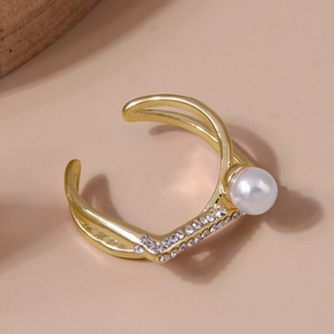Elegant gold open ring featuring a large pearl and sparkling zircon stone accents
