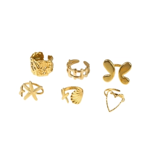 Set of 6 gold plated stainless steel rings featuring starfish shell and butterfly designs