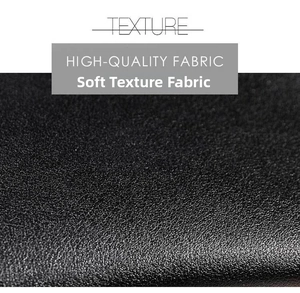 Macro shot of high-quality black faux leather with a soft grained texture for clutch bags