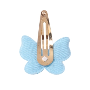 Detail view of the metal BB clip attachment on the blue fabric butterfly hair clip