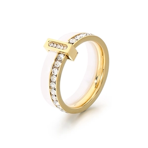 Chic white ceramic and gold titanium ring with zircon pavé in a T-shape cross design
