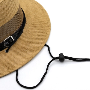 Detail of khaki straw hat with black mesh band and adjustable chin strap