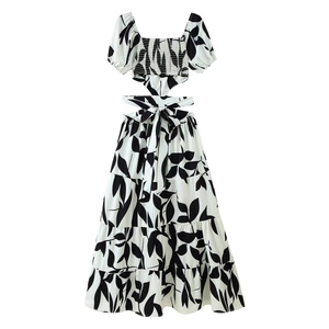 Detail of floral print two-piece set with square neck crop top and tiered maxi skirt