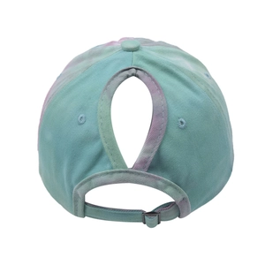 Detail of tie-dye ponytail baseball cap featuring a teardrop-shaped high hair opening